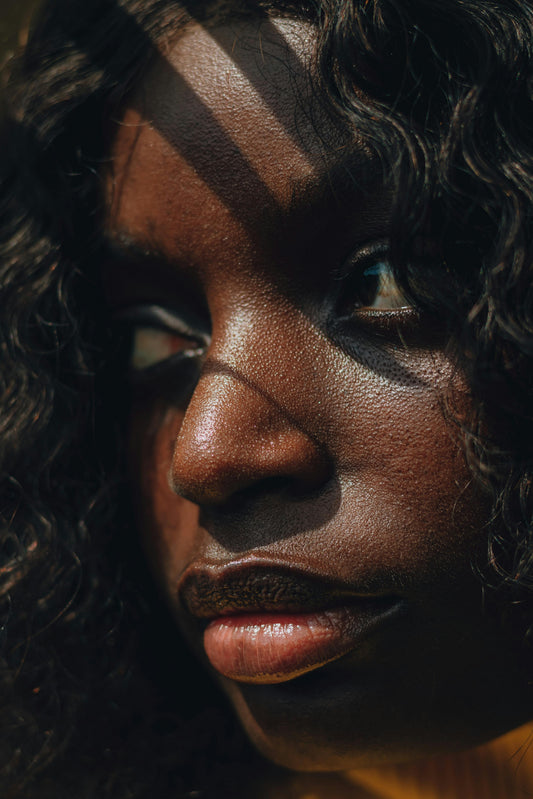 Close up of a woman, with unedited skin texture